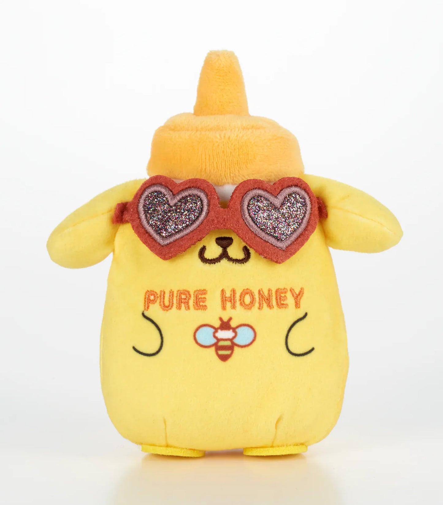 Kawaii YumYum MART DINER Pompompurin PURE HONEY plushie shaped like a yellow honey bottle with floppy ears, bee embroidery, and heart-shaped sunglasses.