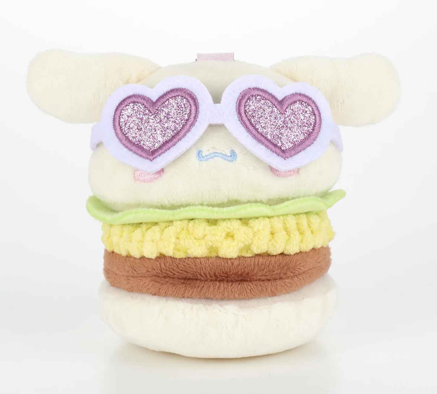 Kawaii YumYum MART DINER Cinnamoroll Pineapple Burger plushie featuring floppy ears, layered burger ingredients, and sparkly heart-shaped sunglasses.