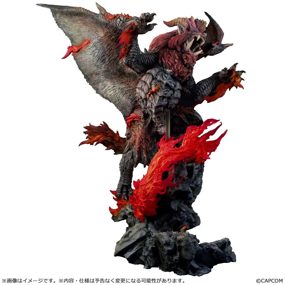 Monster Hunter Capcom Figure Builder Creator's Model Teostra (Rerelease) featuring a fearsome Elder Dragon with massive outstretched wings, a fiery red mane, sharp horns, detailed scales, and red flame effects atop a rocky display base.