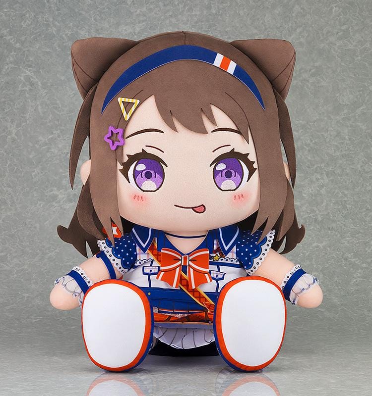BanG Dream! Kasumi Toyama plush seated in a blue and white stage outfit with an orange bow, brown hair, purple eyes, and decorative hair clips.