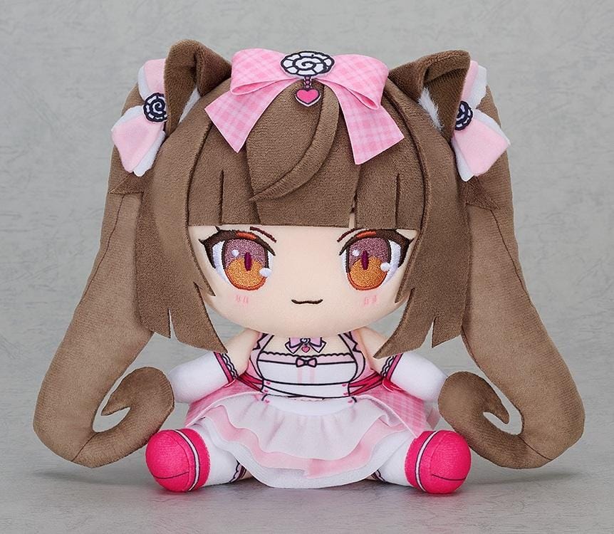 Nekopara Sekai Connect Chocopuni Plushie Chocola Idol Outfit Ver. featuring a brown-haired catgirl with long twin-tails, cat ears, amber embroidered eyes, pink hair bows, and a frilly pink and white idol outfit in a cute seated design.