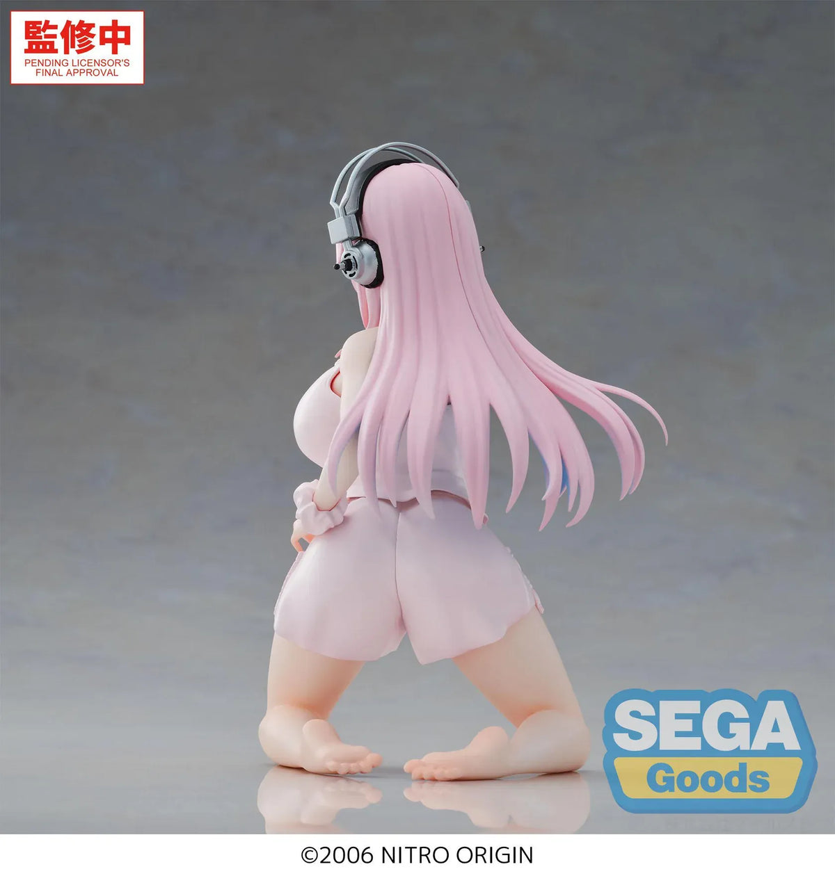 Nitroplus Yumemirize Super Sonico figure wearing pink pajamas and headphones in a kneeling pose