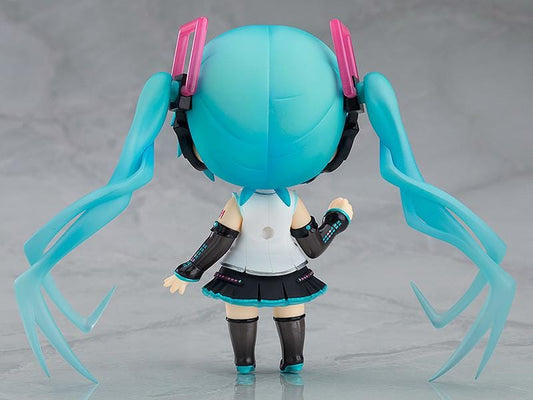 Hatsune Miku Nendoroid Hatsune Miku V4X Figure Rerelease with turquoise twin tails, headset, and black white teal Vocaloid outfit