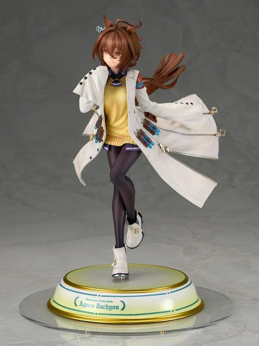 Agnes Tachyon 1/7 scale figure wearing an oversized white laboratory coat, yellow sweater, and dark tights on a decorative base.
