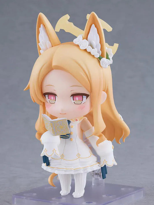 Blue Archive Nendoroid Seia Yurizono chibi figure in white academy outfit with blonde hair and floral accessories