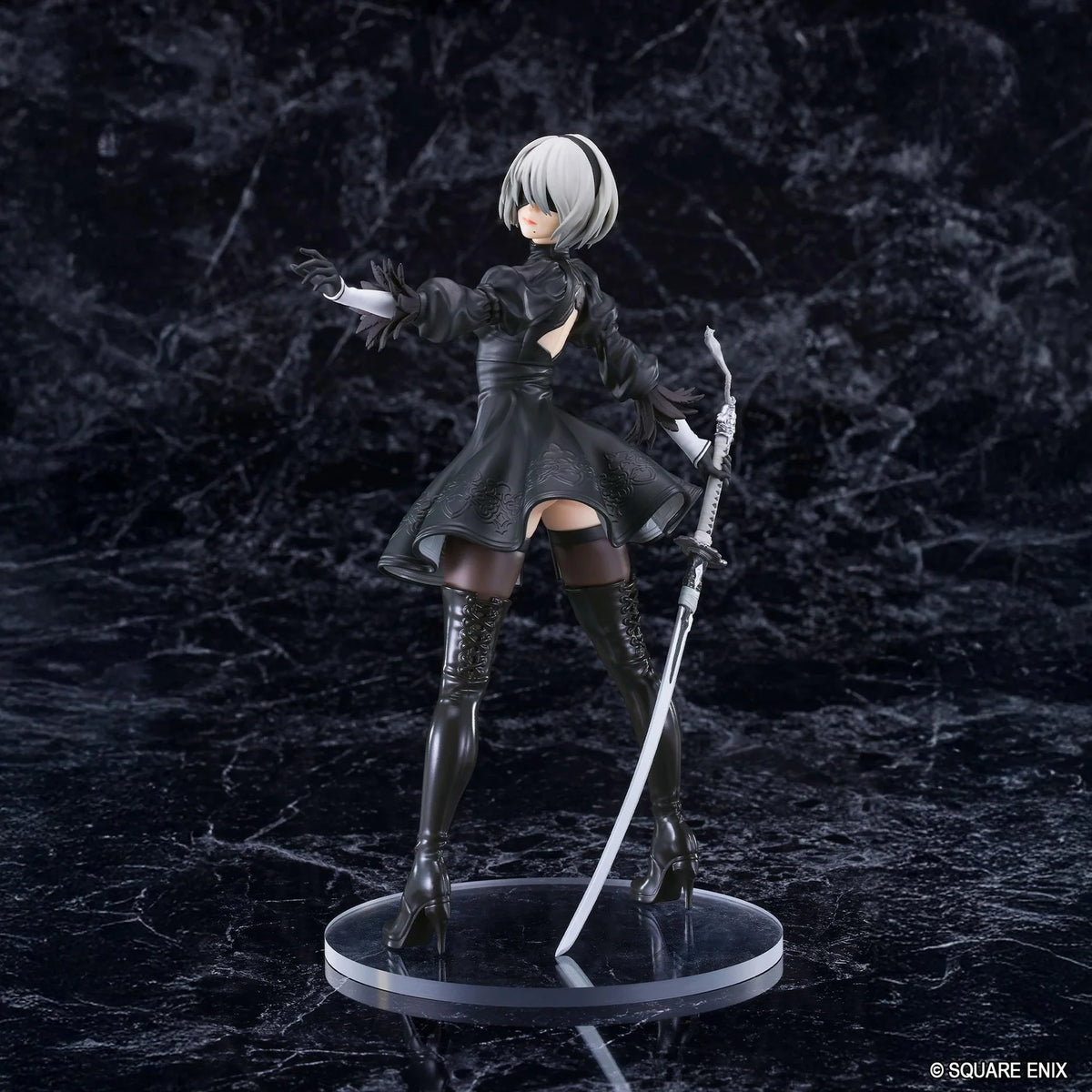 NieR POP UP PARADE 2B YoRHa No.2 Type B L Size Figure featuring a silver-white-haired android wearing a black gothic combat dress, thigh-high boots, and black gloves while holding a large sword on a circular display base.