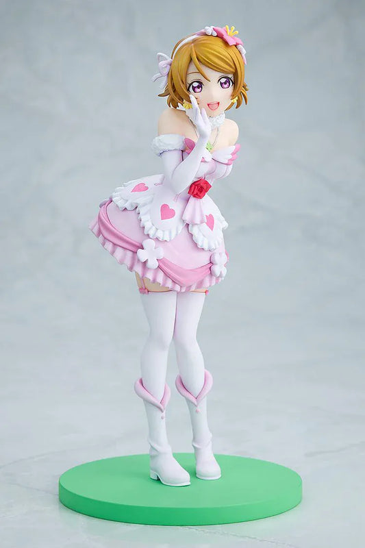 Love Live School Idol Project Hanayo Koizumi Bokutachi wa Hitotsu no Hikari Ver. Figure featuring Hanayo in a pink and white idol outfit with heart details, flower accents, and green display base.