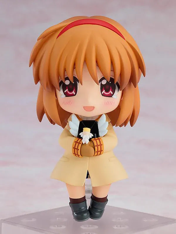 Kanon Nendoroid Ayu Tsukimiya figure featuring short brown hair, a red headband, cream duffle coat, mittens, black boots, and white wing details.
