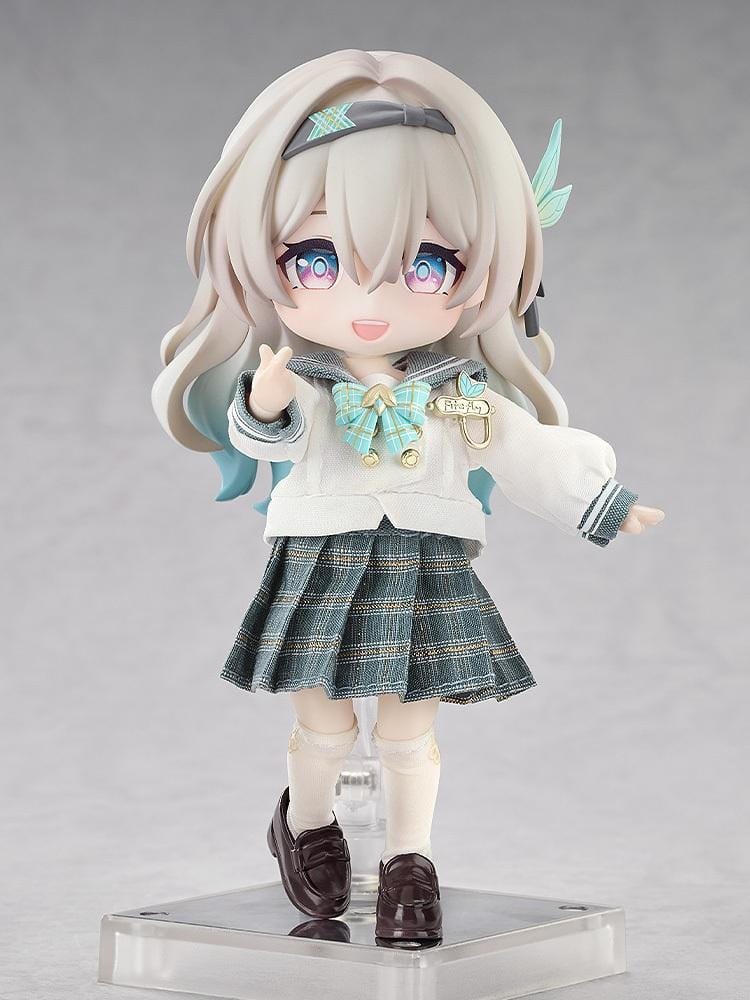 Honkai Star Rail Nendoroid Doll Firefly Spring Missive Ver. featuring silver-blonde hair, colorful eyes, a white sailor-style blouse, green plaid skirt, matching bow, cream knee-high socks, brown loafers, and a brown shoulder bag.