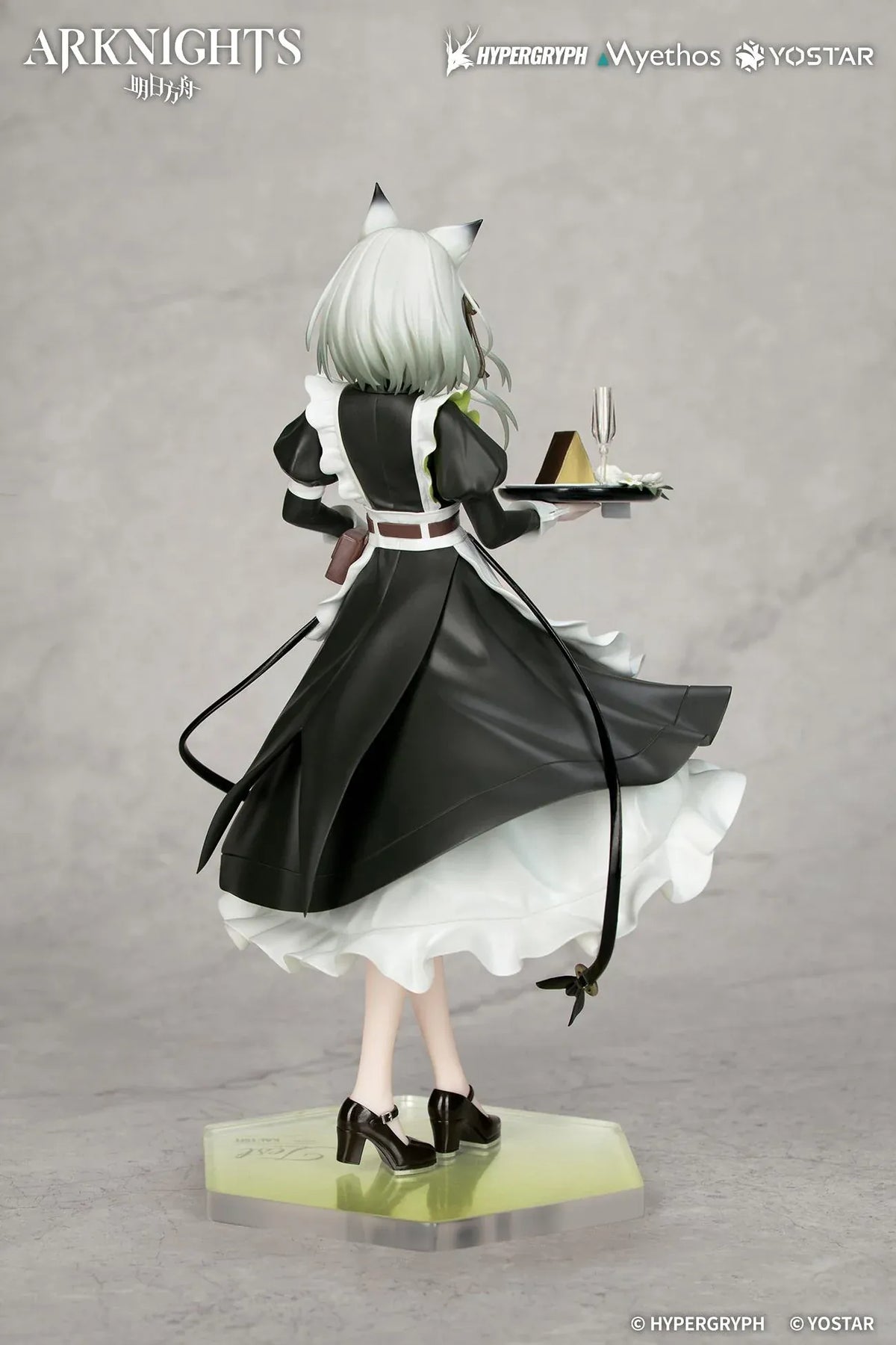 Kal'tsit The Remains of Time Ver. figure wearing a flowing black and white maid dress and holding a serving tray on a translucent green base.