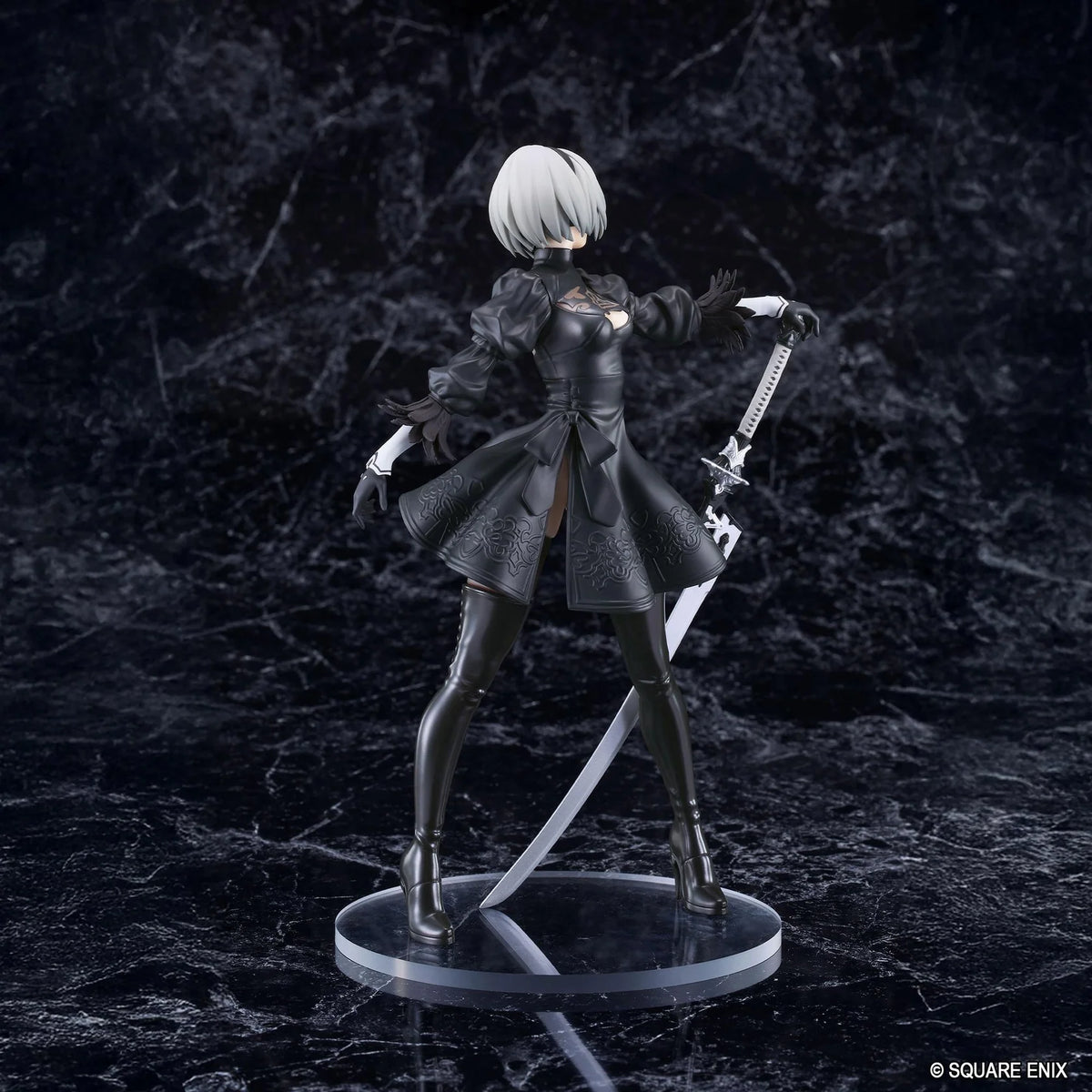 NieR POP UP PARADE 2B YoRHa No.2 Type B L Size Figure featuring a silver-white-haired android wearing a black gothic combat dress, thigh-high boots, and black gloves while holding a large sword on a circular display base.