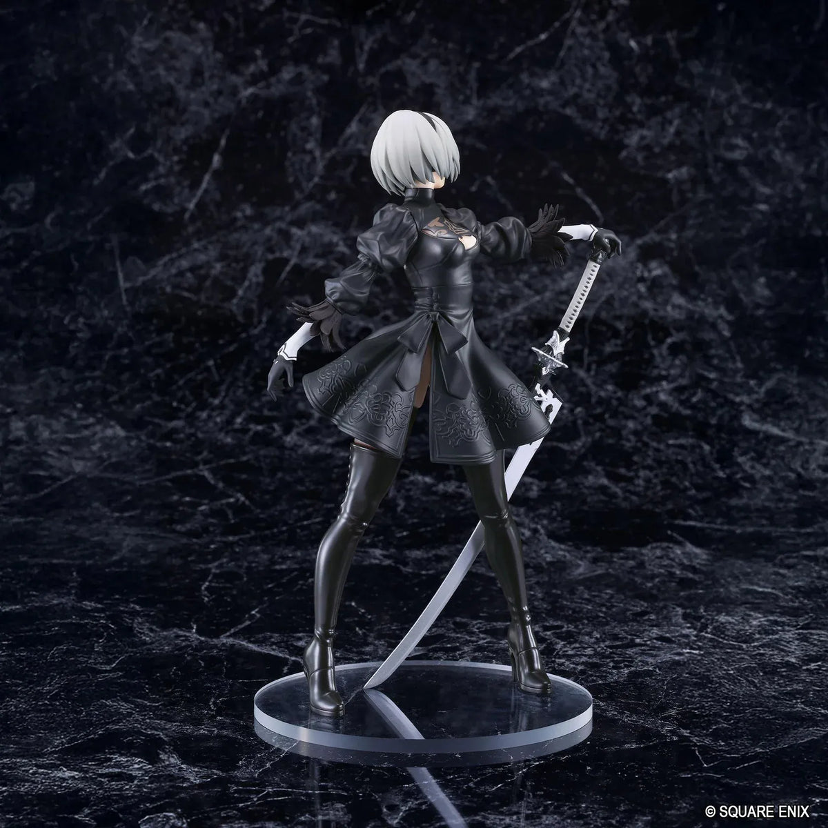 NieR POP UP PARADE 2B YoRHa No.2 Type B L Size Figure featuring a silver-white-haired android wearing a black gothic combat dress, thigh-high boots, and black gloves while holding a large sword on a circular display base.