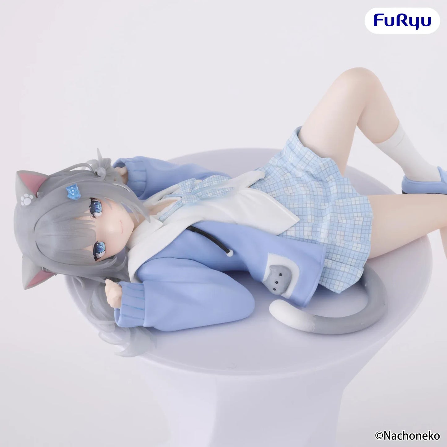 Nachoneko Noodle Stopper Figure by FuRyu featuring Nachoneko lying down in a blue outfit with cat ears and a cushion base.