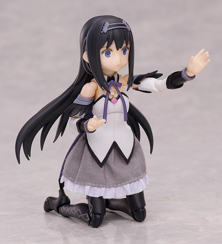 Puella Magi Madoka Magica The Movie Walpurgisnacht Rising BUZZmod. Homura Akemi 1/12 Scale Action Figure featuring long black hair, purple eyes, a white and purple magical girl outfit, fabric skirt, articulated joints, and a circular display base.