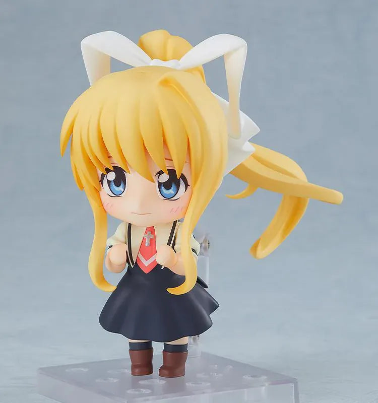 KAGINADO Nendoroid Misuzu Kamio figure featuring blue eyes, long blonde hair, an oversized white ribbon, a dark school dress, and a red necktie.