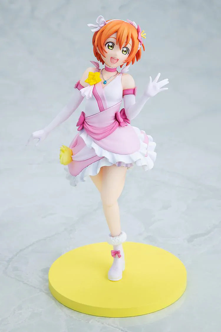 Love Live School Idol Project KD Colle Rin Hoshizora Bokutachi wa Hitotsu no Hikari Ver. Figure featuring Rin in a pink and white idol outfit with yellow flower accents, white gloves, and yellow display base.