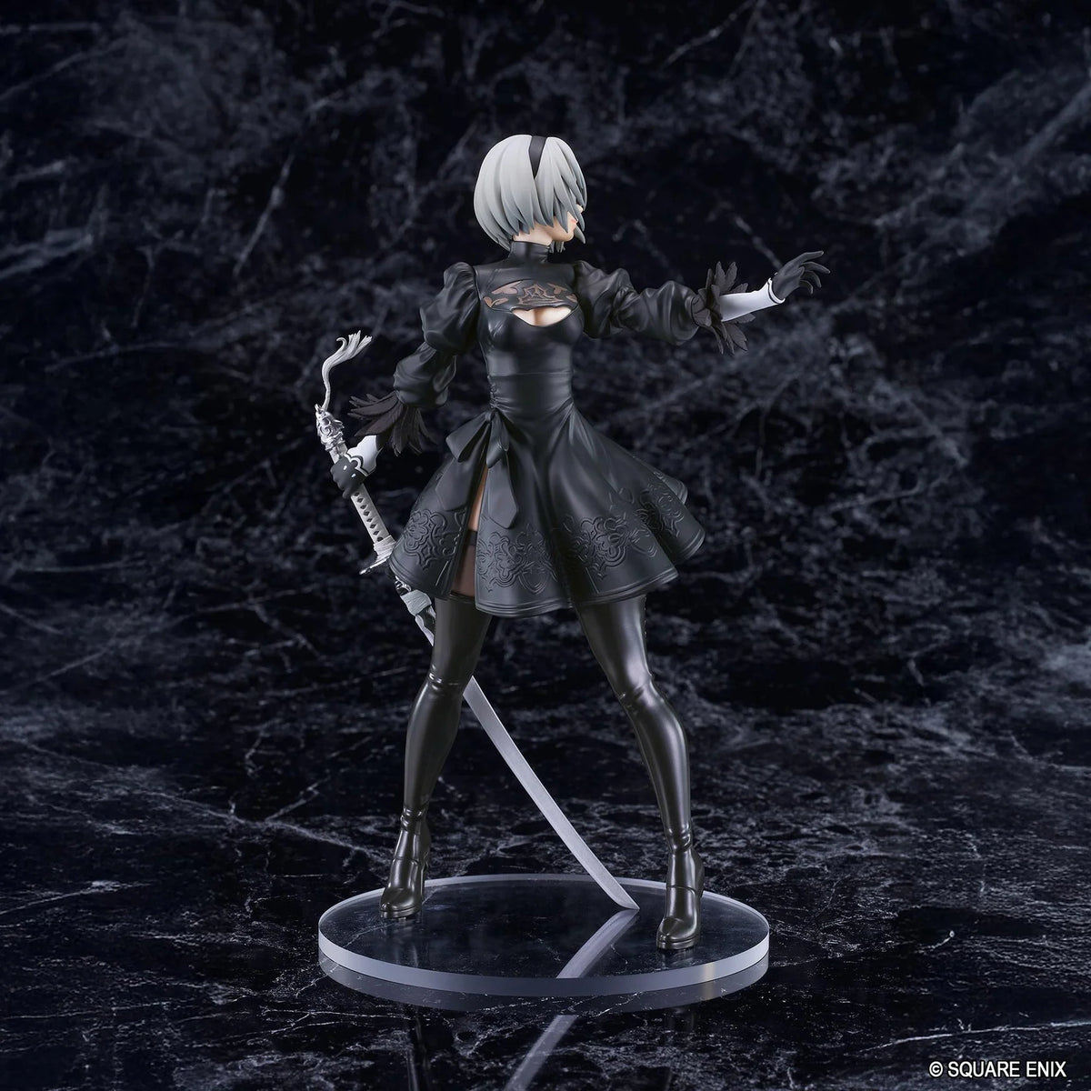 NieR POP UP PARADE 2B YoRHa No.2 Type B L Size Figure featuring a silver-white-haired android wearing a black gothic combat dress, thigh-high boots, and black gloves while holding a large sword on a circular display base.
