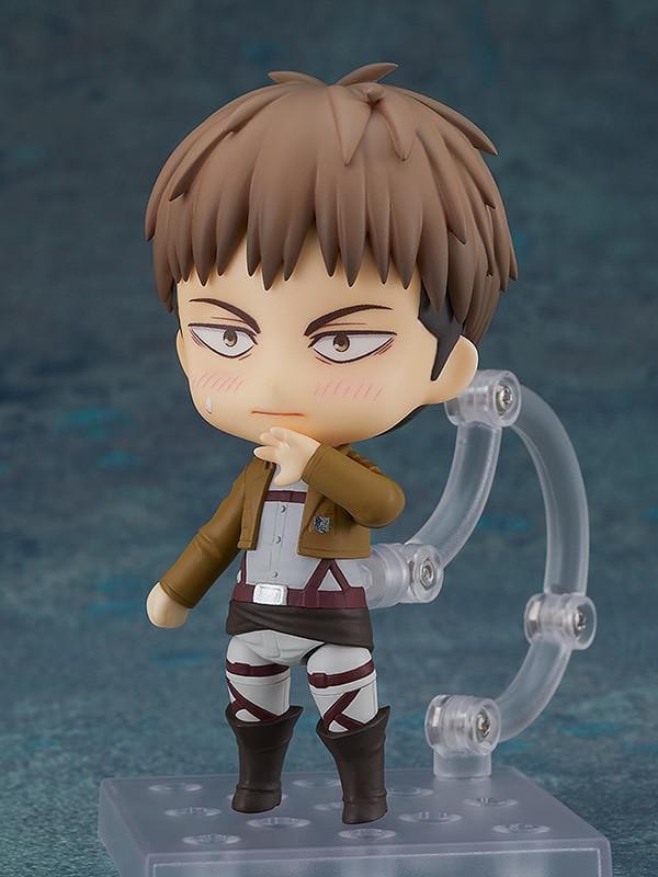 Attack on Titan Nendoroid Jean Kirstein rerelease figure wearing his Survey Corps uniform and green cloak with dual blades and maneuvering gear.