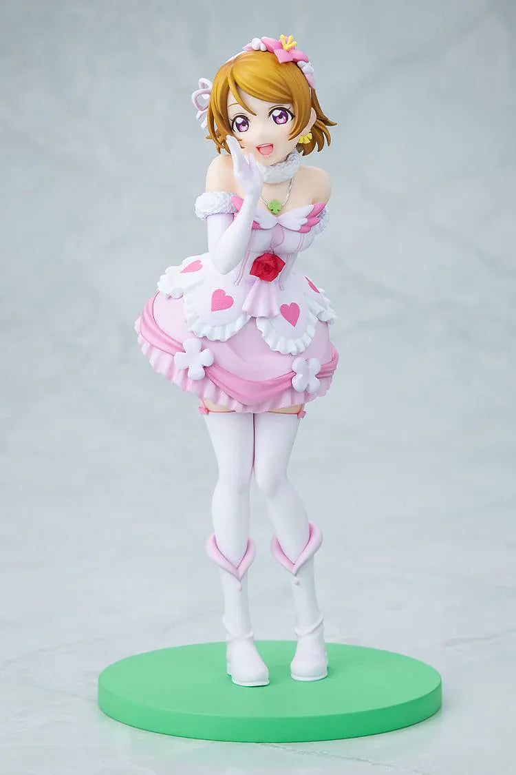 Love Live School Idol Project Hanayo Koizumi Bokutachi wa Hitotsu no Hikari Ver. Figure featuring Hanayo in a pink and white idol outfit with heart details, flower accents, and green display base.