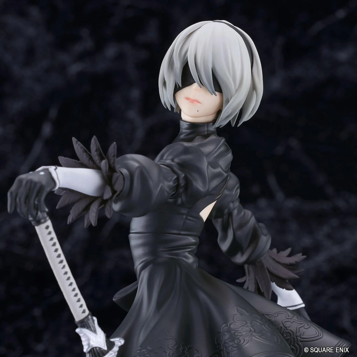 NieR POP UP PARADE 2B YoRHa No.2 Type B L Size Figure featuring a silver-white-haired android wearing a black gothic combat dress, thigh-high boots, and black gloves while holding a large sword on a circular display base.