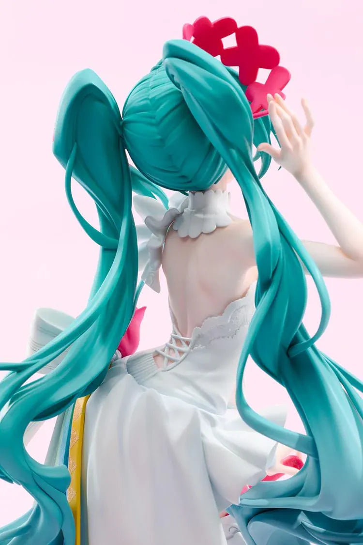 GOOD SMILE RACING G.S. Collection Racing Miku 15th Rhapsody 2010-2025 1/7 Scale Figure with white outfit, teal twin-tails, red rose, and colorful ribbons