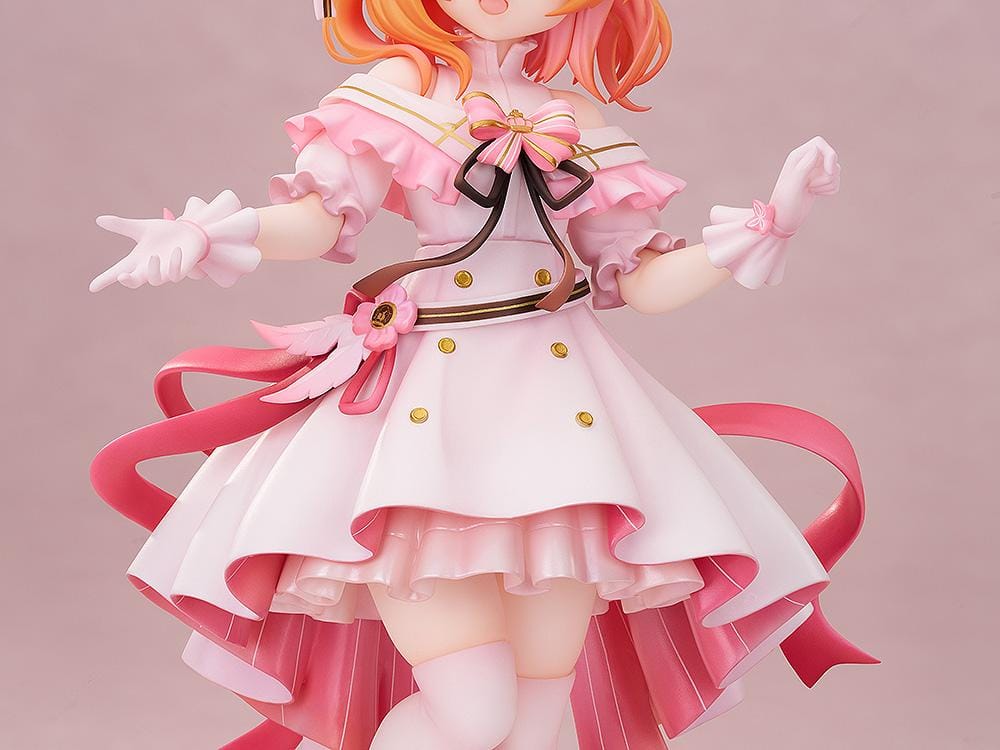 Is the Order a Rabbit Cocoa Dress Ver. 1/7 Scale Figure wearing an elegant pink and white frilled dress with ribbons and floral accessories