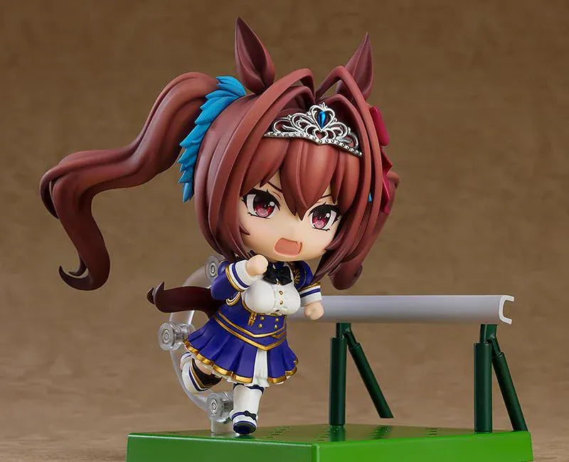 Umamusume Pretty Derby Nendoroid Daiwa Scarlet figure featuring twin-tail hair, horse ears, tiara, and blue white and gold outfit