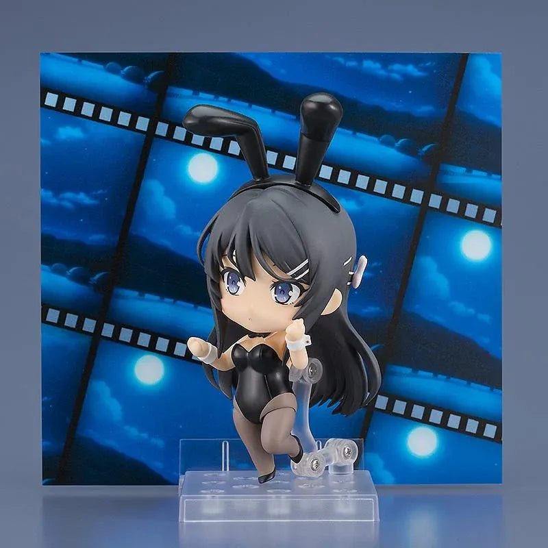 Rascal Does Not Dream of Bunny Girl Senpai Nendoroid Mai Sakurajima Bunny Girl Ver. (Rerelease) featuring a black-haired anime girl with blue eyes wearing a black bunny suit, bunny ears, sheer tights, white wrist cuffs, and a black bow tie.