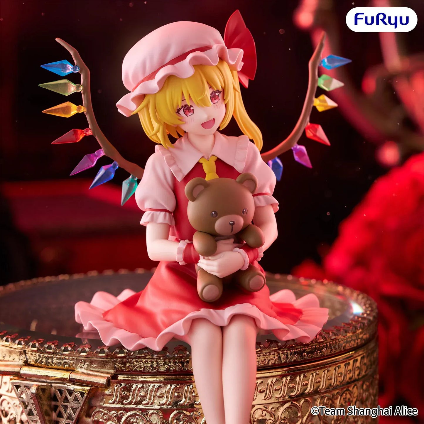Touhou Project Flandre Scarlet Noodle Stopper figure holding a teddy bear with colorful crystal wings and a seated pose