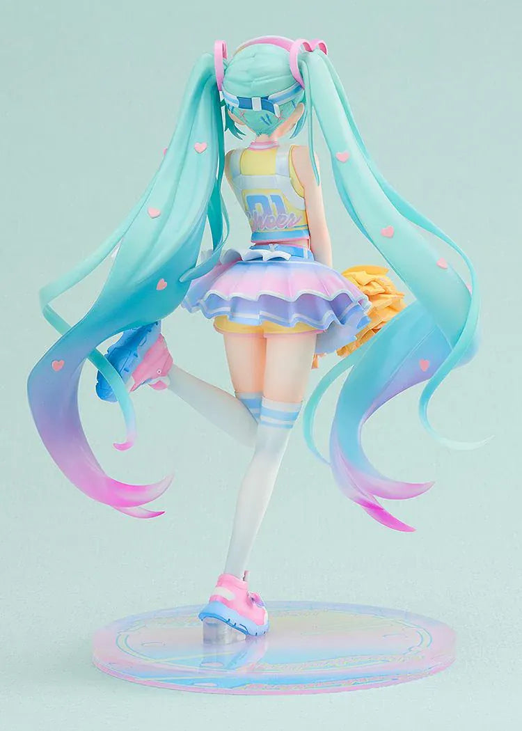 Hatsune Miku Cheerleading Ver. 1/7 scale figure holding yellow pom-poms, with turquoise twin-tails, a pastel outfit, and one leg lifted.