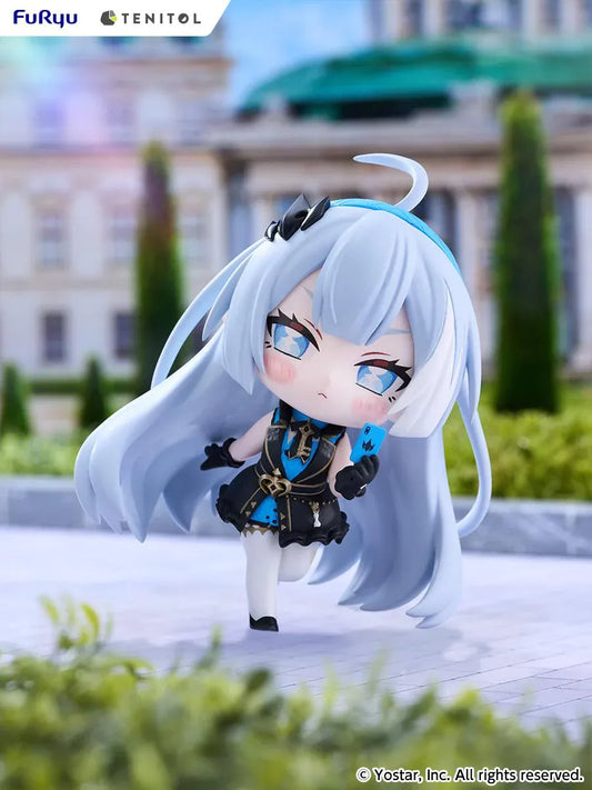 Stella Sora TENITOL Mini Tyrant Figure by FuRyu featuring a light-blue-haired anime girl with blue eyes wearing a black and blue outfit with gold accents, black gloves, and white stockings while holding a small blue device.