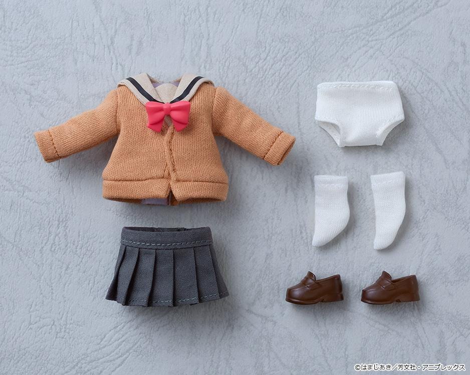 Bocchi the Rock Nendoroid Doll Ikuyo Kita featuring Kita with red hair, green eyes, a fabric cardigan outfit, skirt, socks, and loafers.
