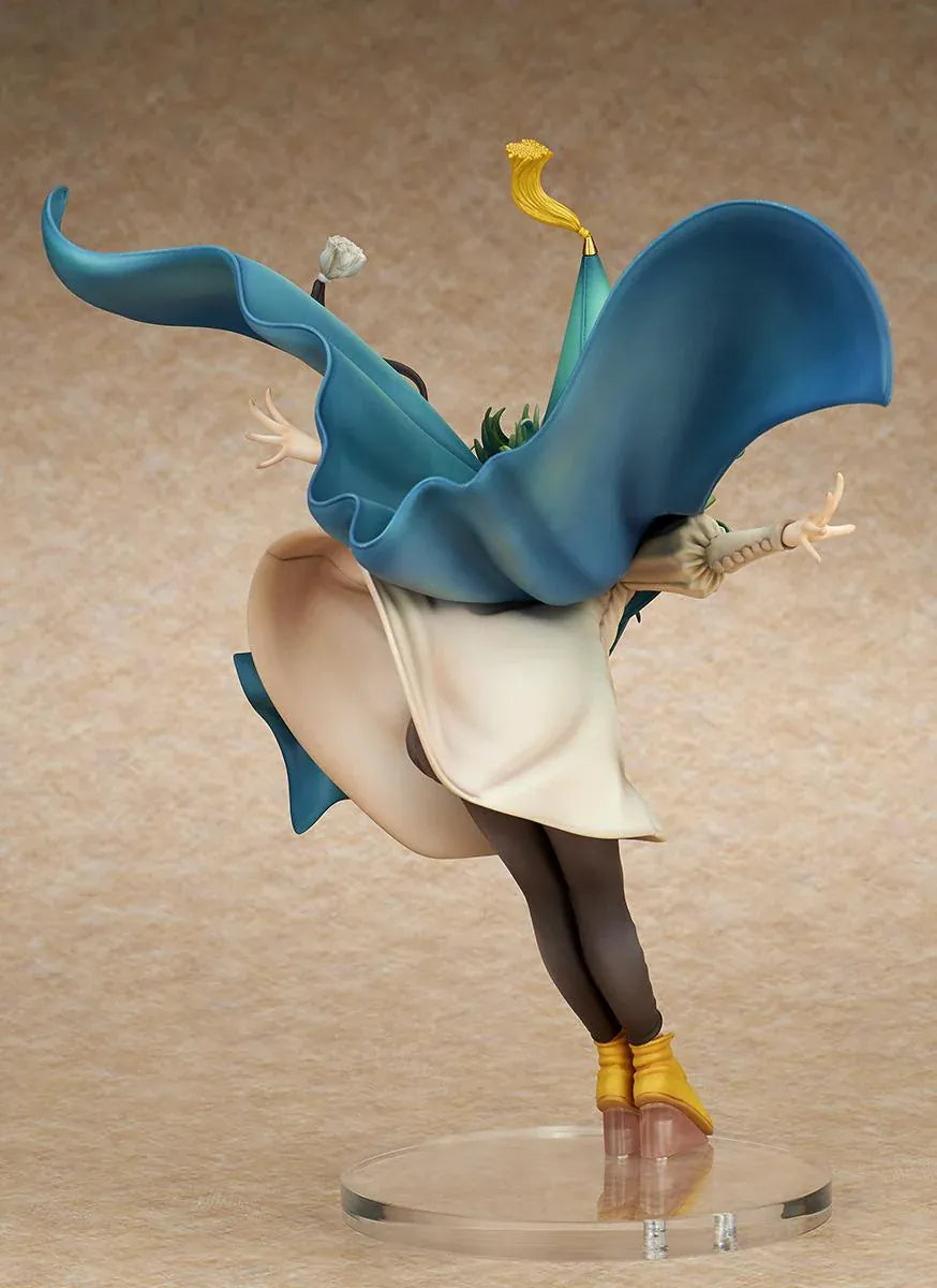 Witch Hat Atelier Coco 1/6 scale figure in a dynamic airborne pose wearing a pointed witch hat, cream dress, teal cloak, and golden shoes.