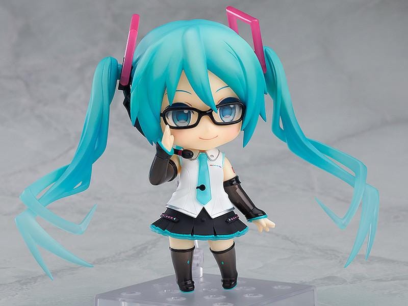 Hatsune Miku Nendoroid Hatsune Miku V4X Figure Rerelease with turquoise twin tails, headset, and black white teal Vocaloid outfit