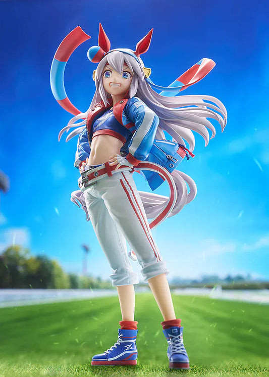 Uma Musume: Cinderella Gray Tamamo Cross 1/7 Scale Figure featuring Tamamo Cross in her vibrant blue and red racing jacket with confident pose and long flowing twin tails.