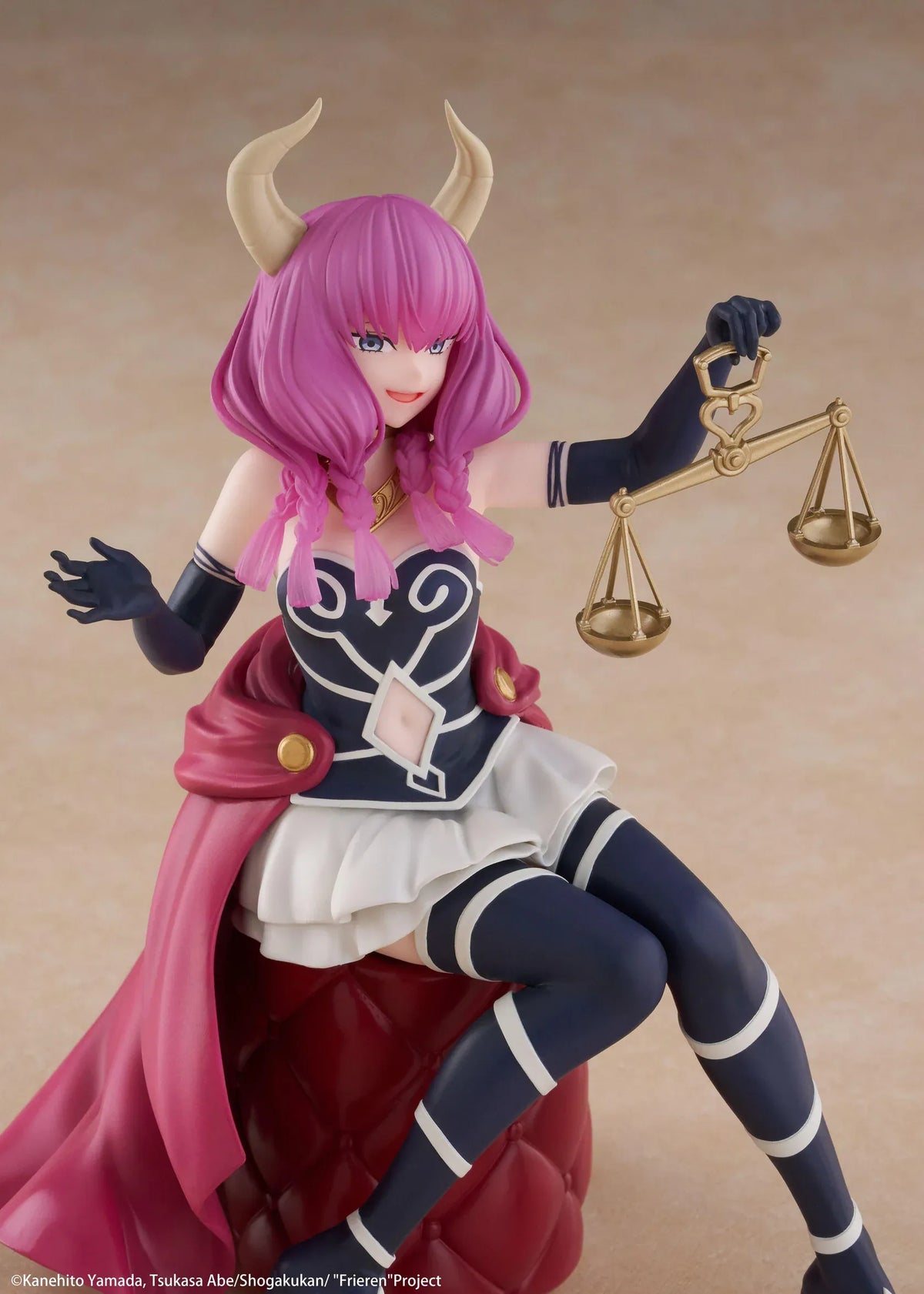 Desktop Cute Aura figure seated on a burgundy tufted stool, with purple hair, curved horns, a dark outfit, and golden balance scales held aloft.