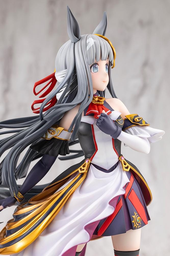 Umamusume Pretty Derby Chrono Genesis 1/7 Scale Figure featuring a silver-gray-haired horse girl with blue eyes, horse ears, and a flowing white, black, red, and gold racing outfit standing on a grassy display base.