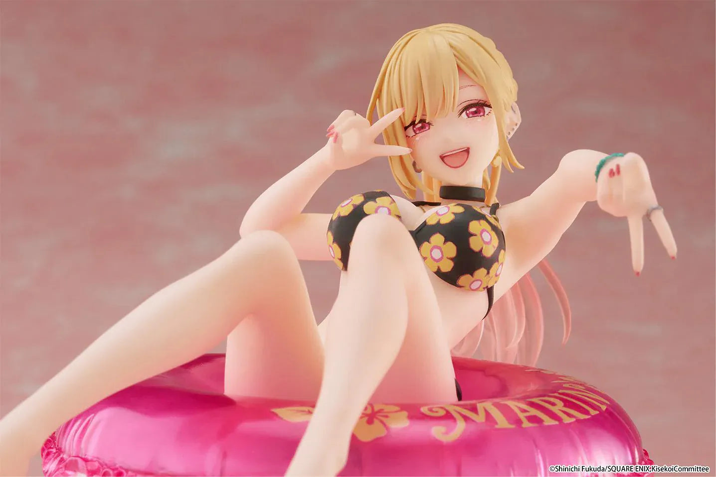 My Dress-Up Darling Aqua Float Girls Marin Kitagawa Figure Rerelease featuring Marin relaxing on a pink swim float with floral swimsuit and translucent water-style base.
