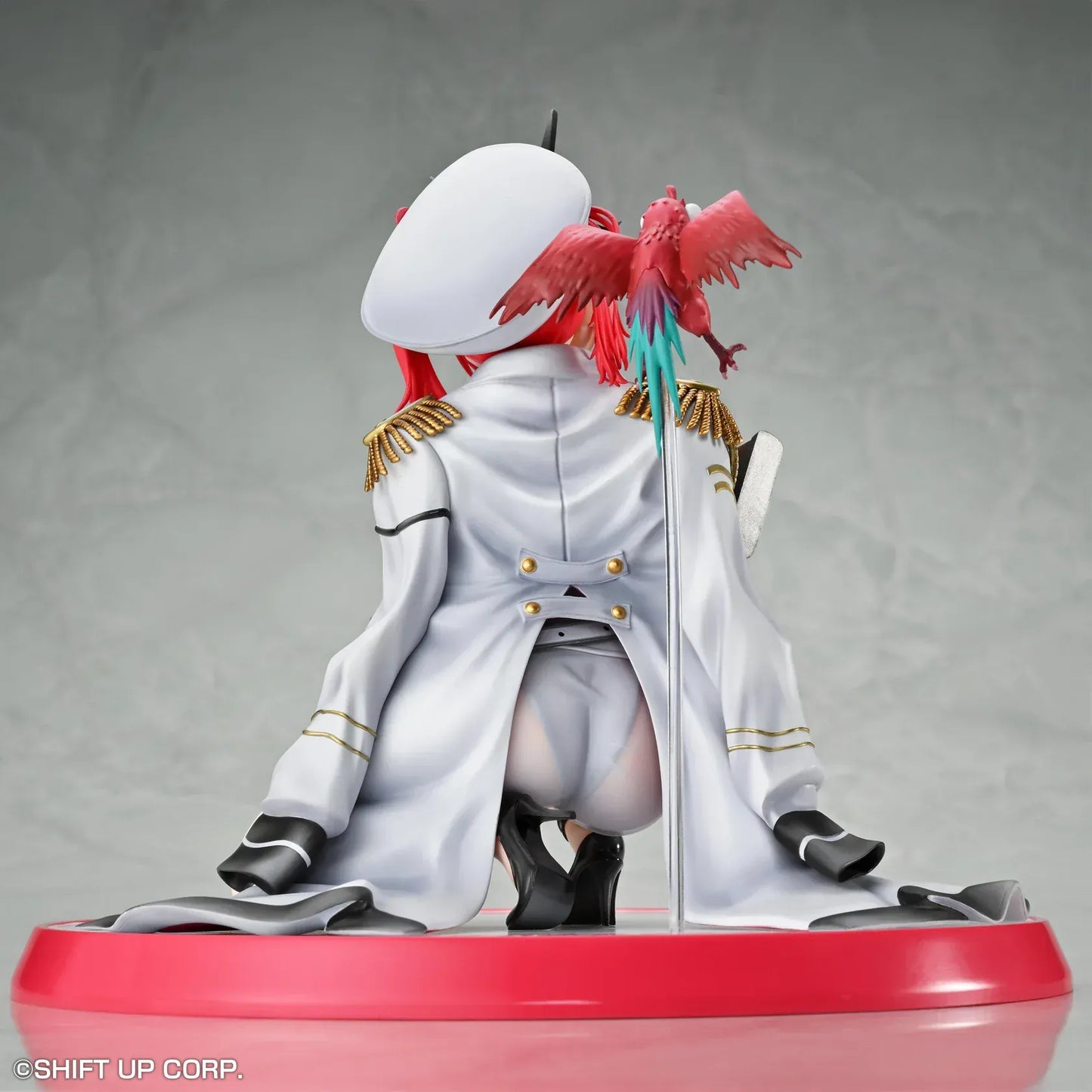 Goddess of Victory: Nikke Mast 1/7 scale figure kneeling on red-and-white base in white naval uniform with rifle and red parrot