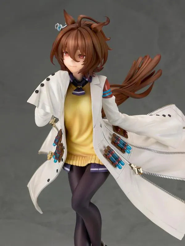 Agnes Tachyon 1/7 scale figure wearing an oversized white laboratory coat, yellow sweater, and dark tights on a decorative base.