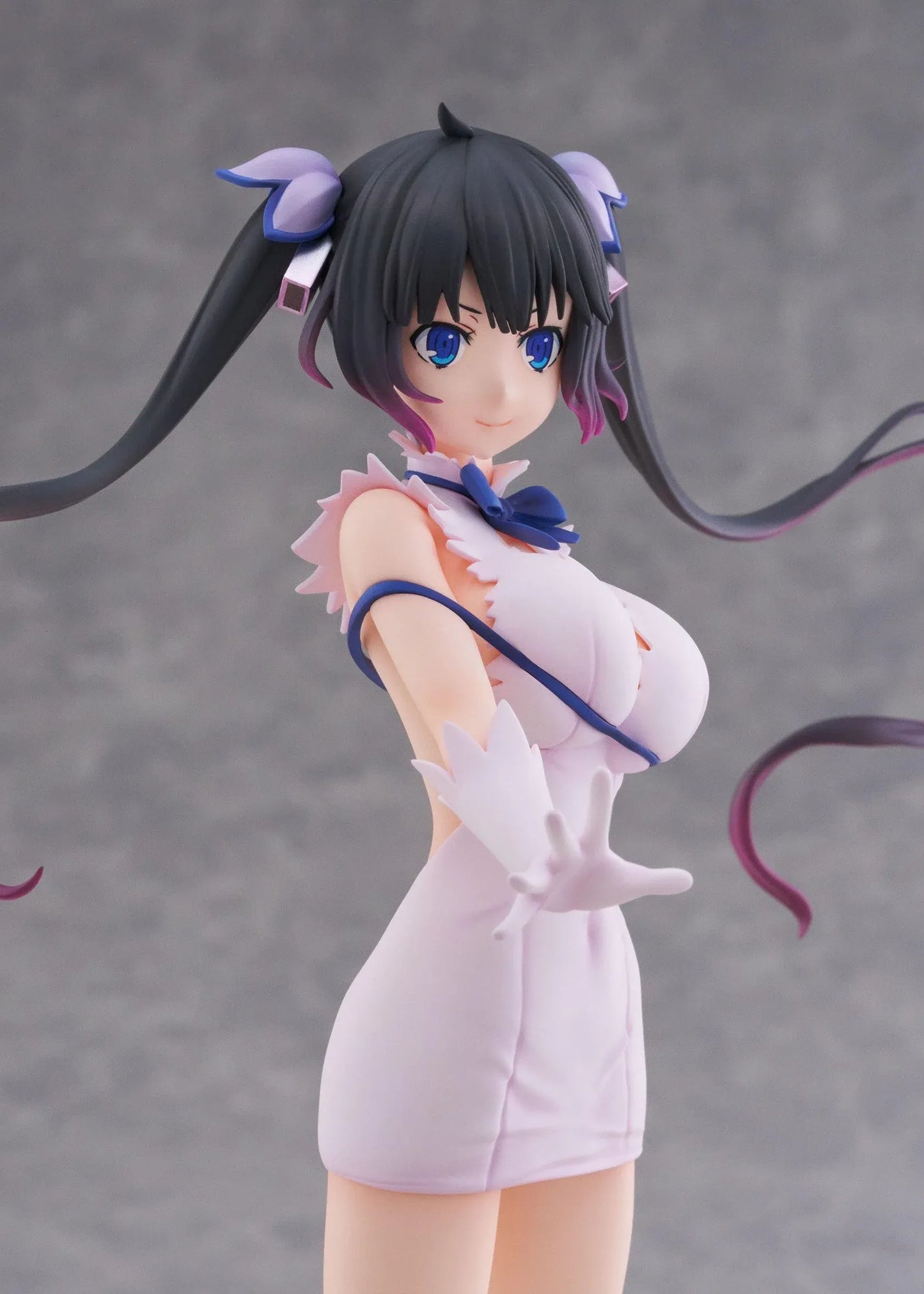 Is It Wrong to Try to Pick Up Girls in a Dungeon V Hestia Divinity Unleashed Limited Edition Ver. 1/7 Scale Figure with twin-tails, white outfit, blue ribbon accents, rocky base, and flame effect parts
