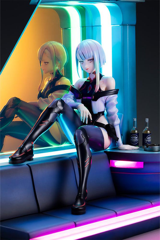 Cyberpunk Edgerunners Lucy 1/7 Scale Figure seated on a cyberpunk diorama base with blue translucent panel and neon details