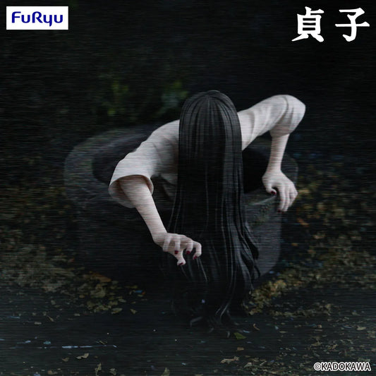 Sadako Noodle Stopper Figure by FuRyu featuring the iconic horror character crawling from a well with long black hair and pale hands.