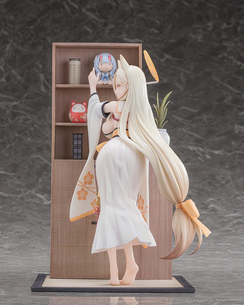 Blue Archive Kaho (Memorial Lobby Ver.) 1/7 Scale Figure in shrine maiden-inspired outfit with fox ears, long blonde hair, and bookshelf backdrop.