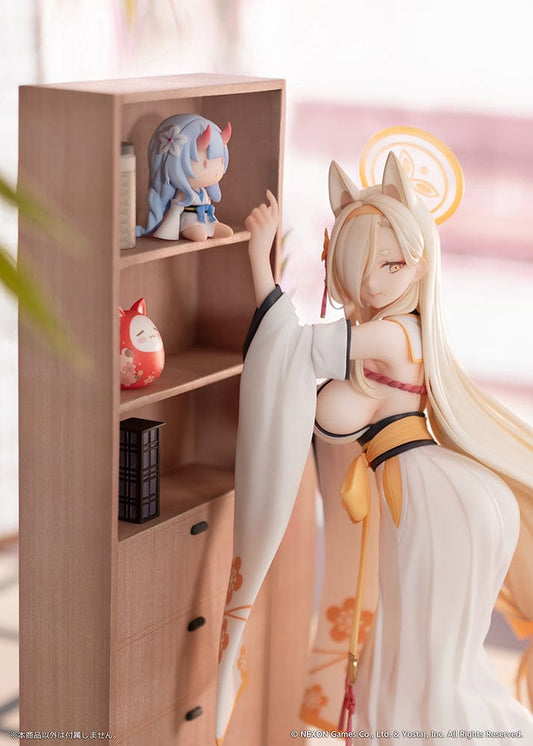 Blue Archive Kaho (Memorial Lobby Ver.) 1/7 Scale Figure in shrine maiden-inspired outfit with fox ears, long blonde hair, and bookshelf backdrop.