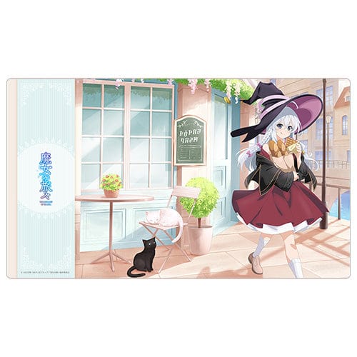 The Journey of Elaina Original Illustration Rubber Mat – Elaina (Eating Around Version) featuring Elaina in witch attire, walking past a European-style café with a scenic background, potted plants, and playful cats.
