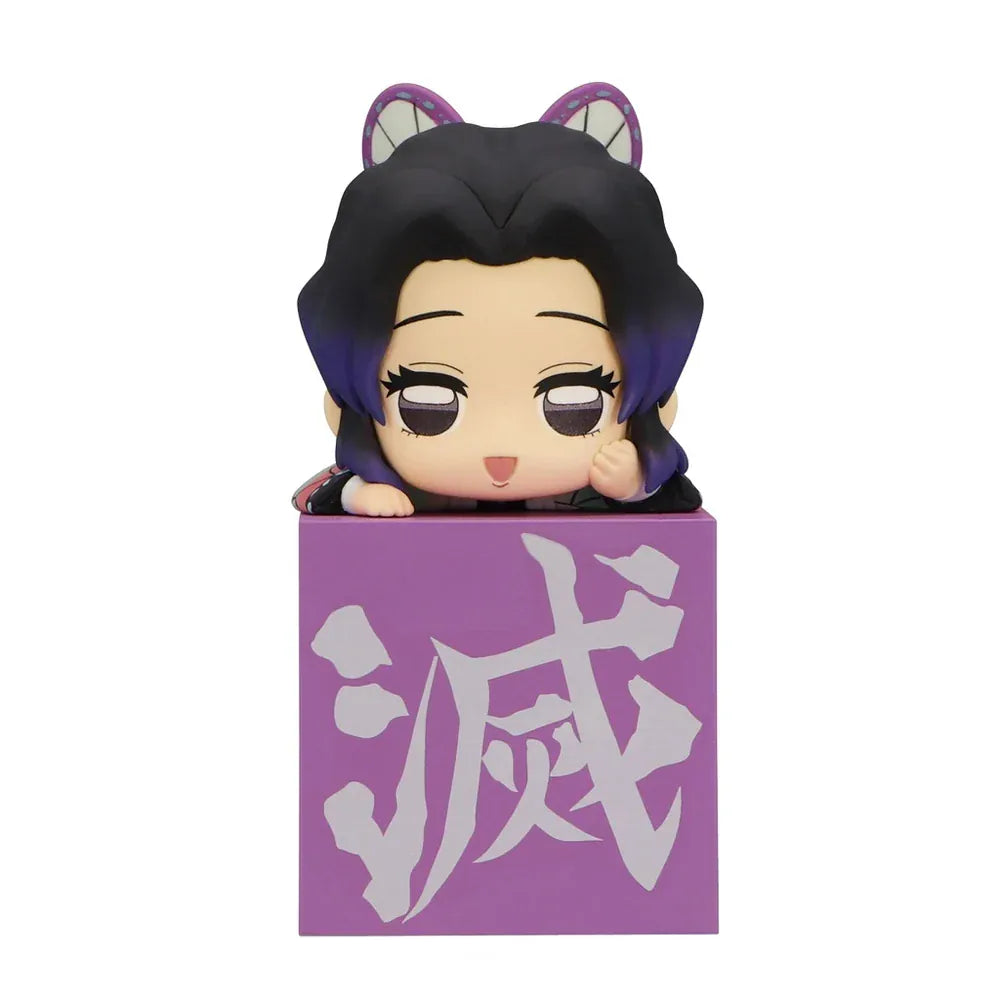 Demon Slayer Hikkake Hashira 2 Shinobu Kocho chibi figure resting on a purple display block with the Demon Slayer Corps emblem.
