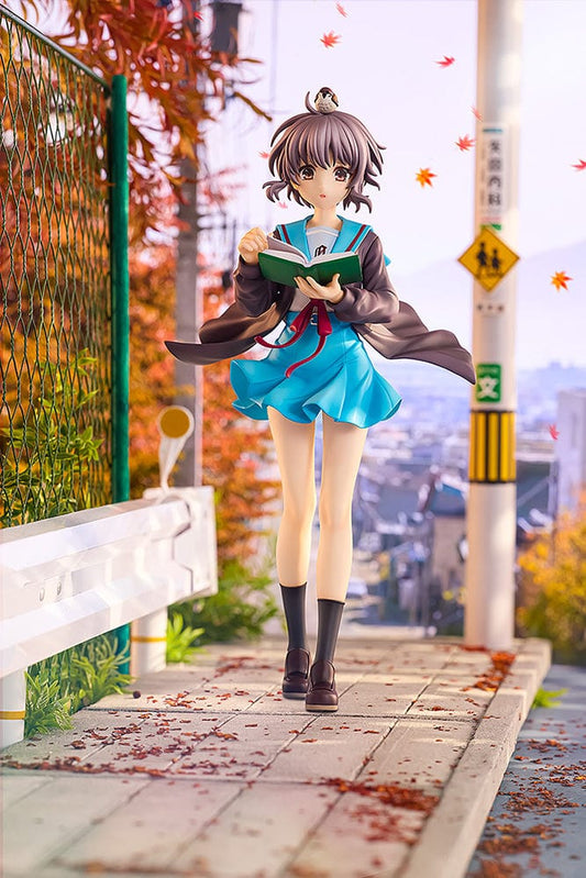 The Melancholy of Haruhi Suzumiya KD Colle Yuki Nagato (Light Novel Ver.) 1/7 Scale Figure, depicting Yuki in a school uniform reading a book on a scenic autumn street.