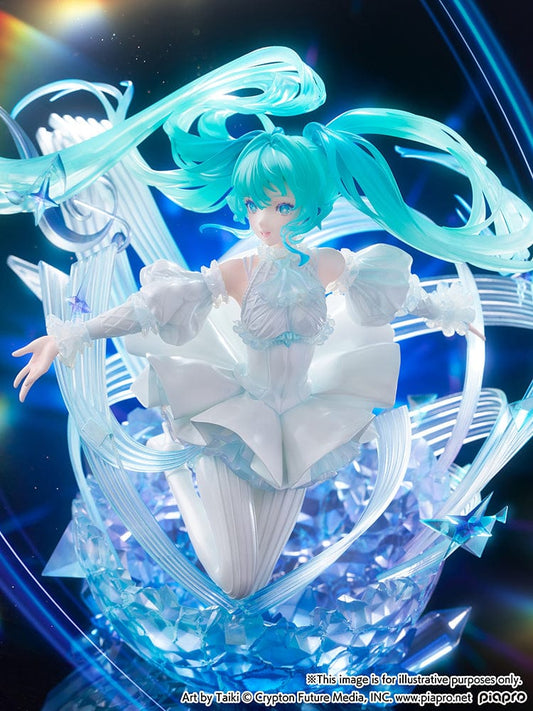 “Hatsune Miku (Crystal Dress Ver.) 1/7 scale figure—Miku in a white dress with translucent twin-tails, surrounded by swirling musical ribbons on a blue crystal base.”
