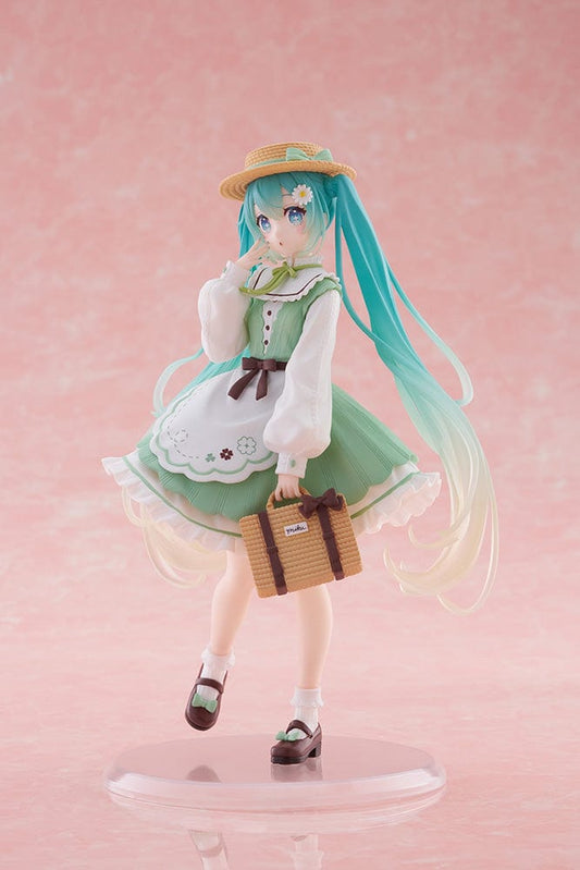 Vocaloid Fashion Hatsune Miku (Country Ver.) Figure wearing a pastel green dress, straw hat, and holding a picnic basket, with flowing teal twin-tails.